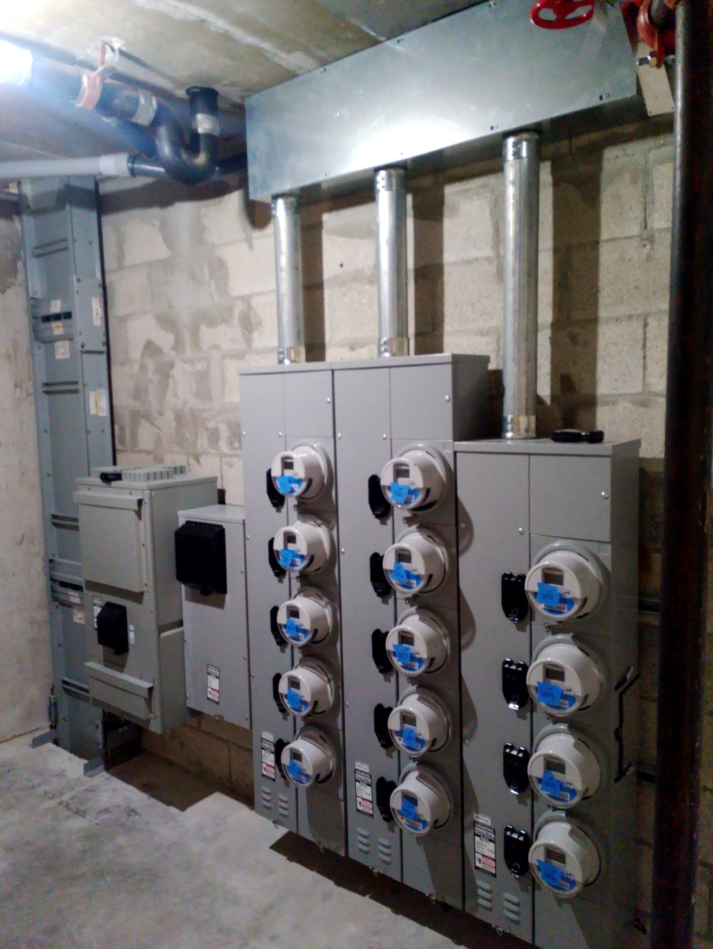 New utility meter center with the building's meter banks installed