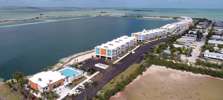 Aerial view of the Quarry Phase III apartments, pool deck and parking