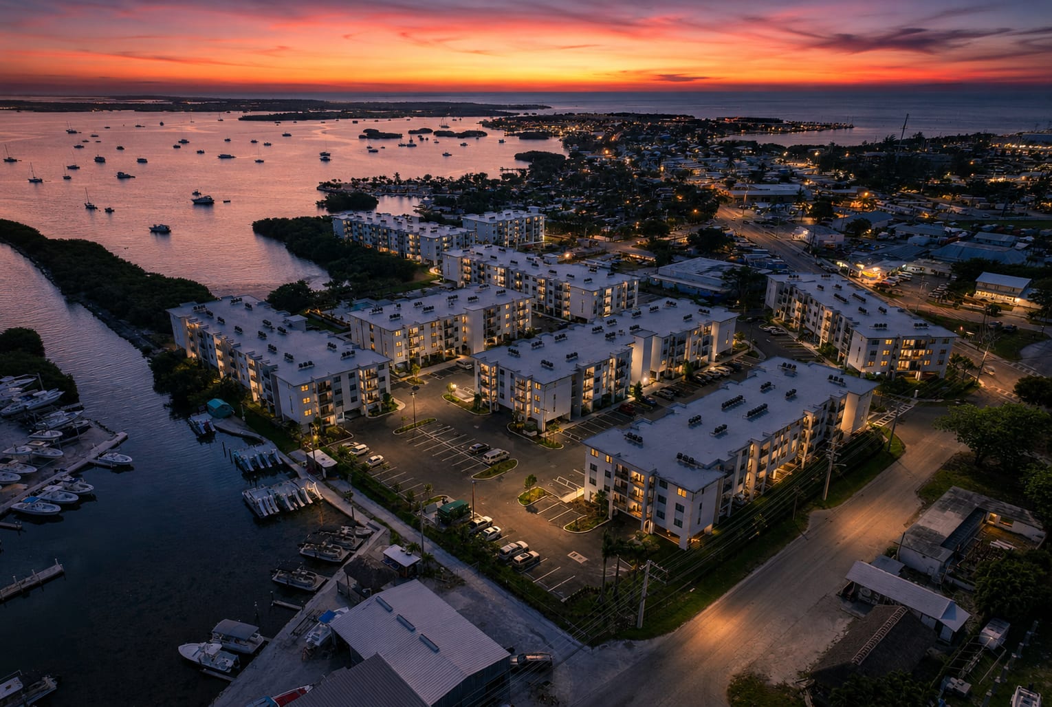 Wreckers Cay at sunset, the eight apartment buildings and the Stock Island waterfront