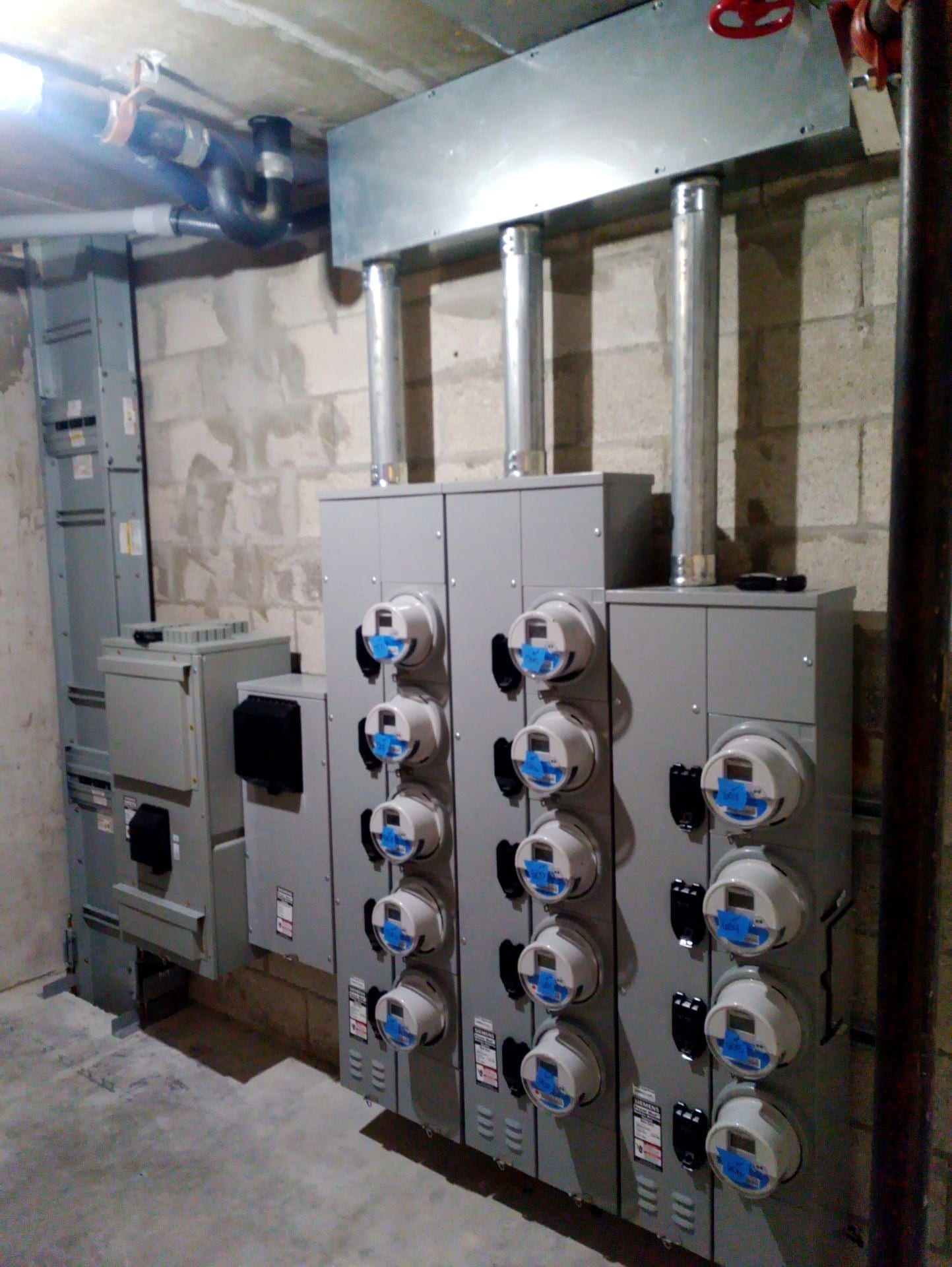 New utility meter center with the building's meter banks installed